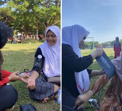 Mahasiswa UUI memberikan pelayanan kesehatan kepada masyarakat di Blang Padang, Minggu (28/4/2024).